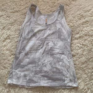 Lucy.com: White and grey tank top. Used. Size large.